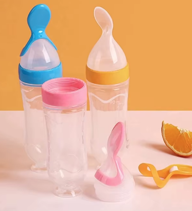 Kit Colher e Chupeta Magia de Mãe Amor Maternal – Colher Dosadora e Chupeta Mágica de Frutas, Verde, Azul e Rosa